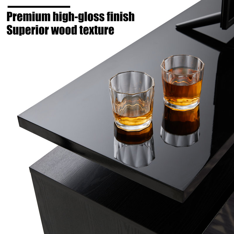 Wade Logan® Bhhatu High Gloss TV Stand for TVs, Electric Wade Logan® Bhhatu High Gloss TV Stand for TVs, Electric